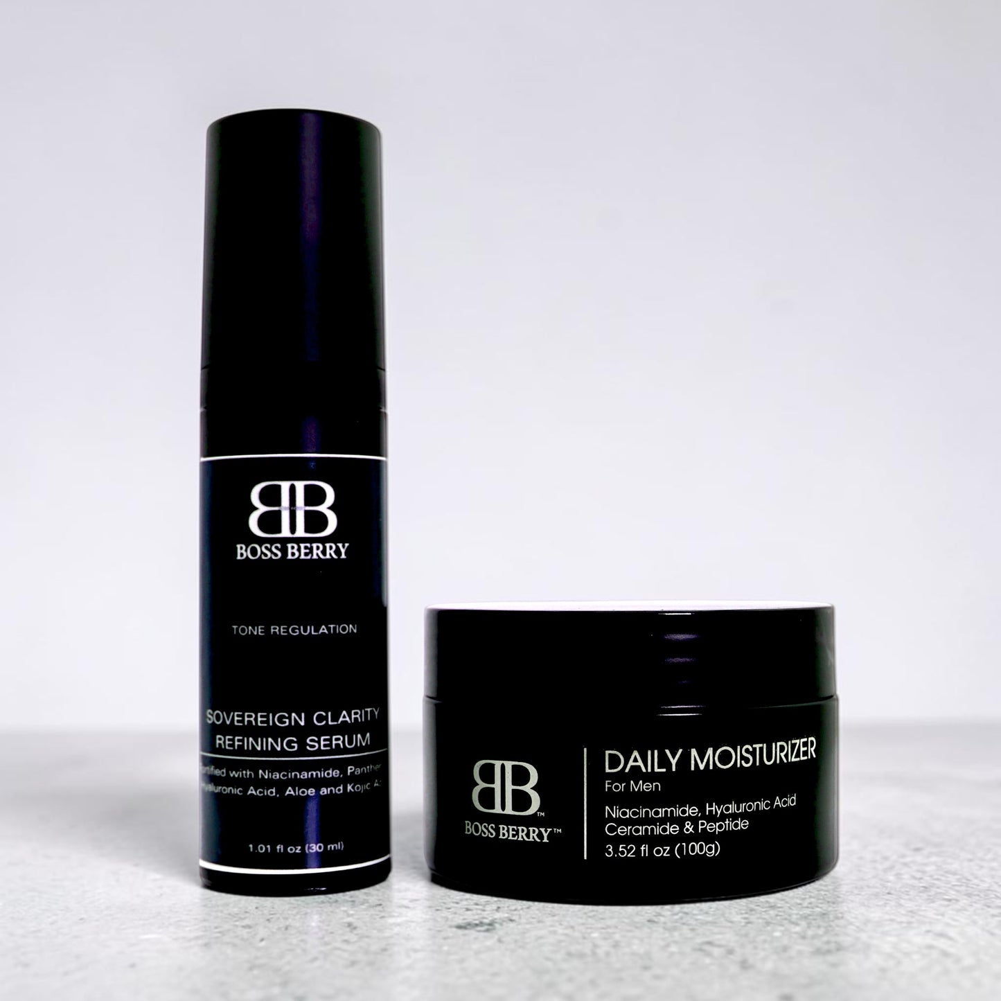 BOSS BERRY Sovereign Clarity Refining Serum and Regimen No. 1 Daily Moisturizer Bundle on a light gray background