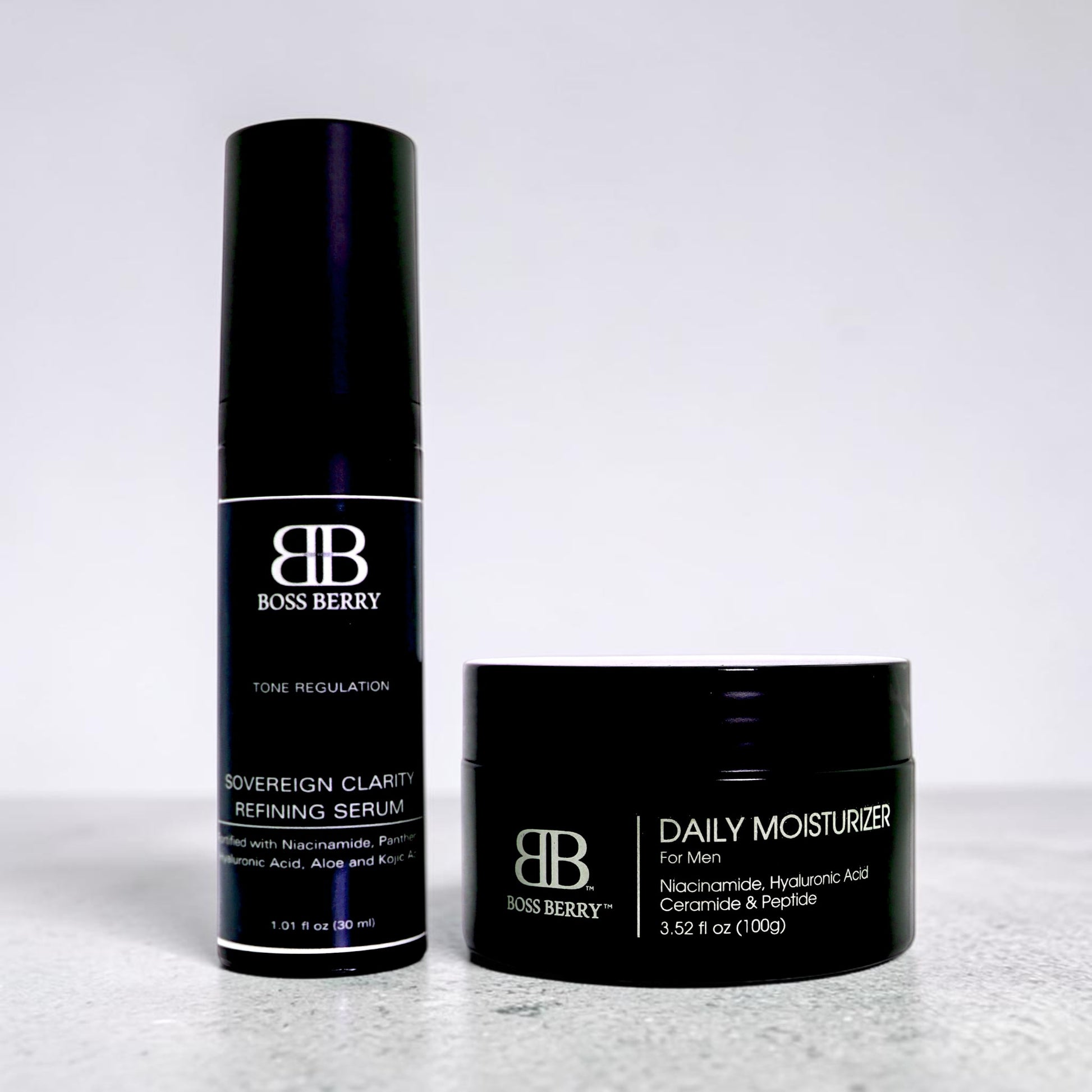 BOSS BERRY Sovereign Clarity Refining Serum and Regimen No. 1 Daily Moisturizer Bundle on a light gray background