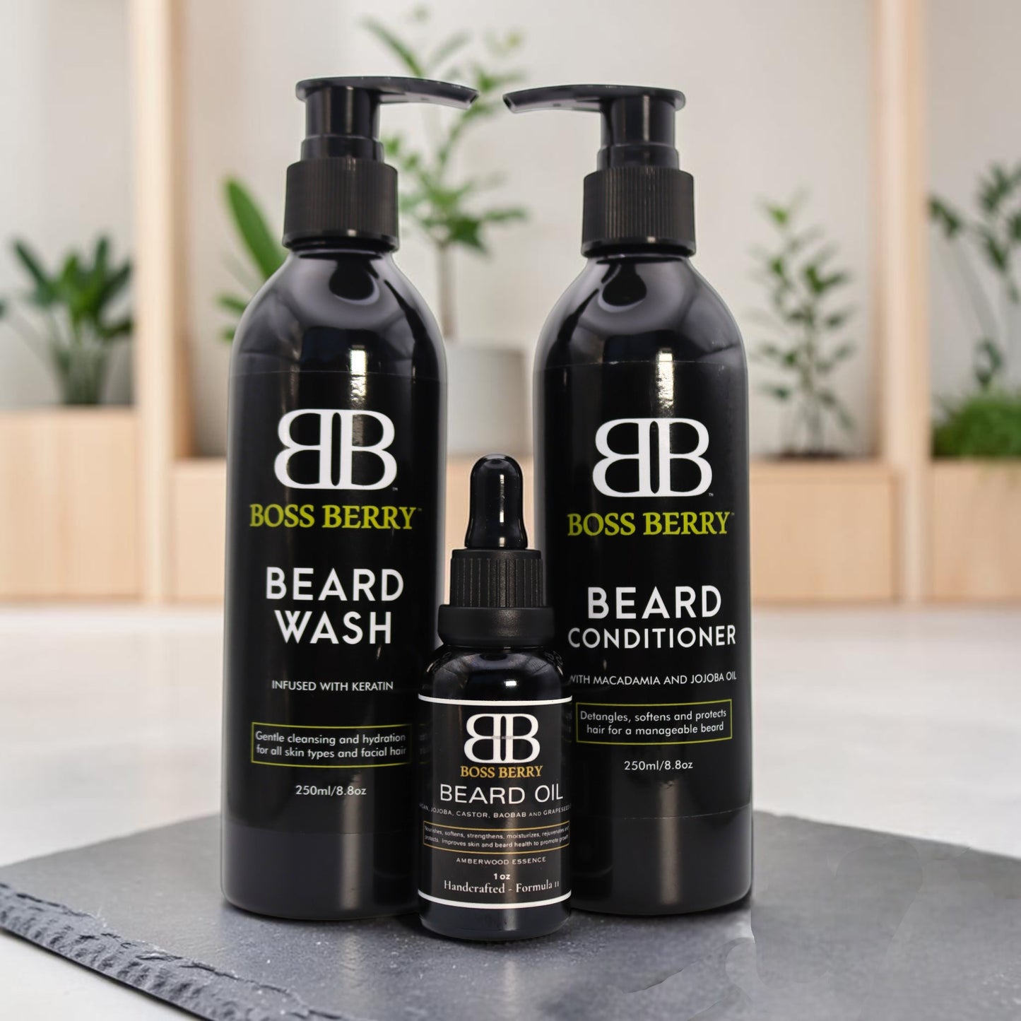BOSS BERRY  Sovereign Obsidian Core Beard Bundle including wash, conditioner, and oil on a black surface with a blurred indoor background.