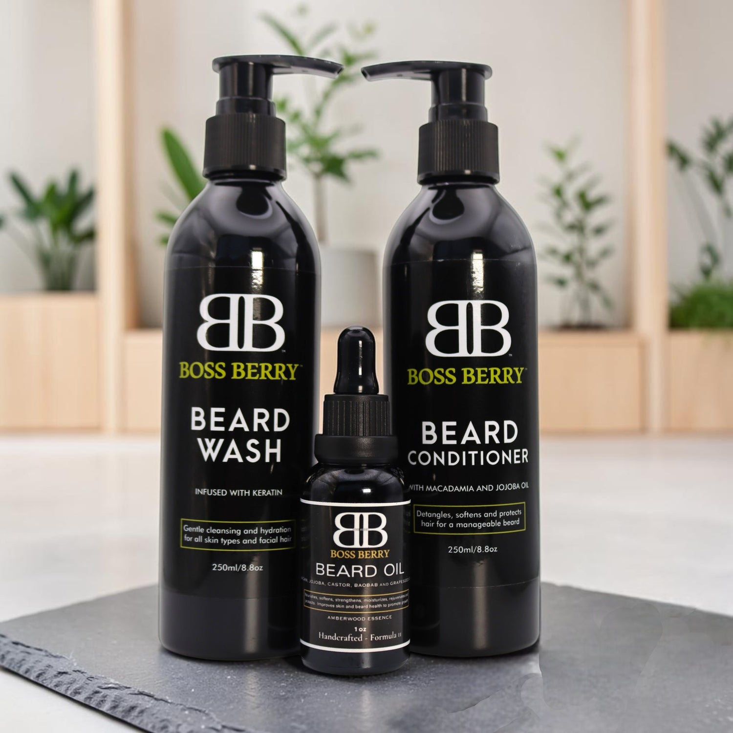 BOSS BERRY  Sovereign Obsidian Core Beard Bundle including wash, conditioner, and oil on a black surface with a blurred indoor background.