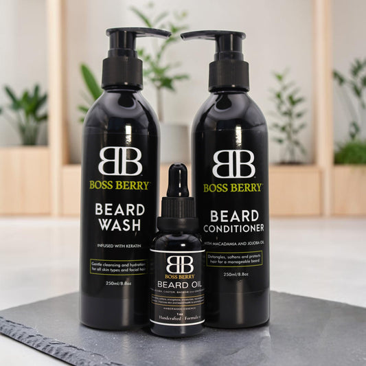 BOSS BERRY  Sovereign Obsidian Core Beard Bundle including wash, conditioner, and oil on a black surface with a blurred indoor background.