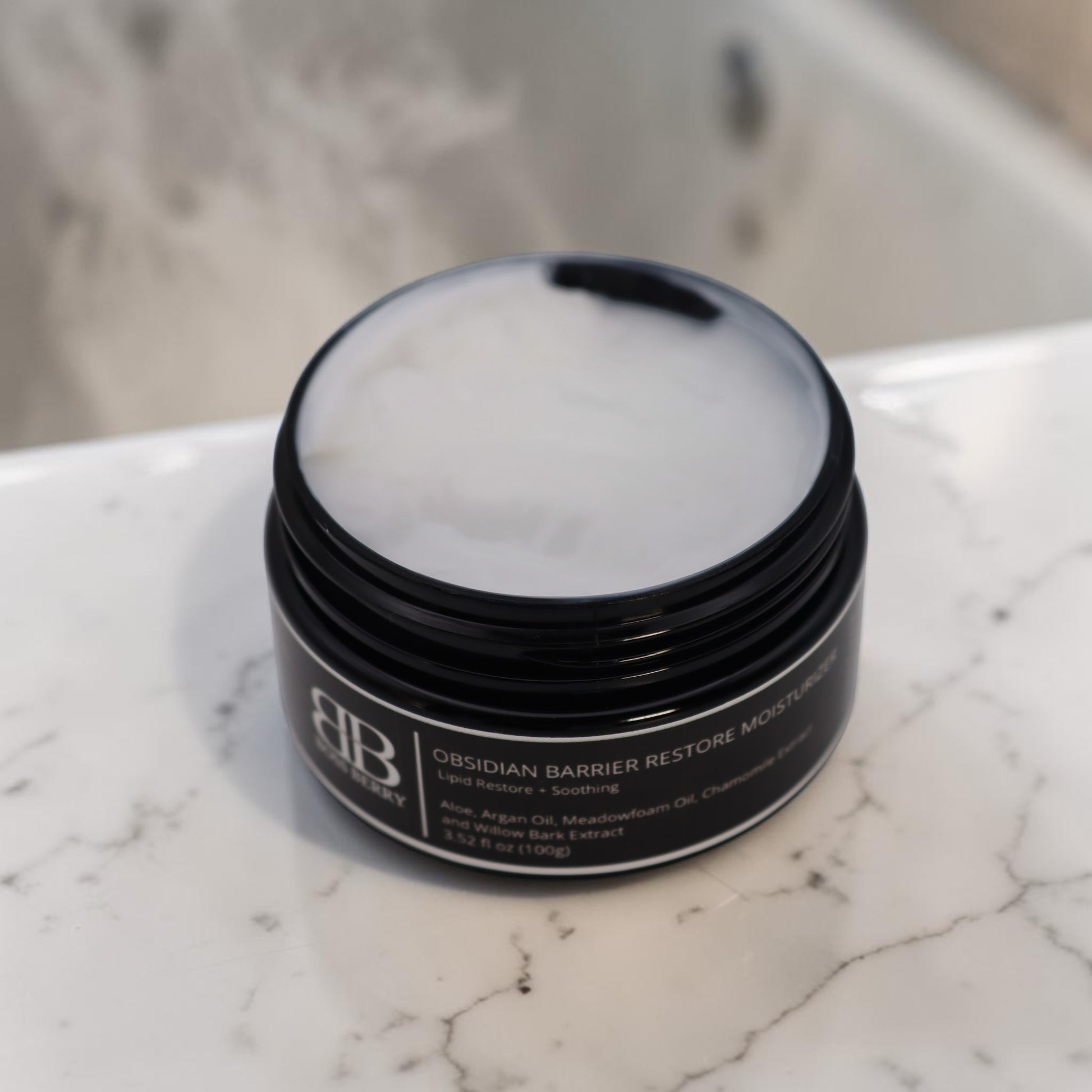Barrier Restore Moisturizer Open Jar on marble counter