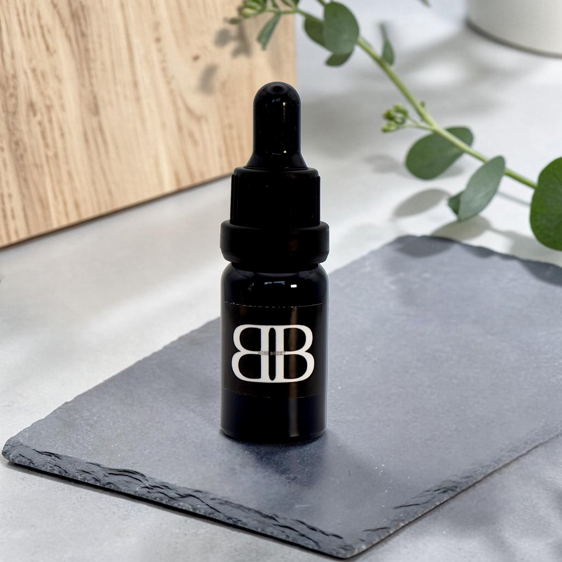 Sovereign Beard Elixir Sample by BOSS BERRY on slate background