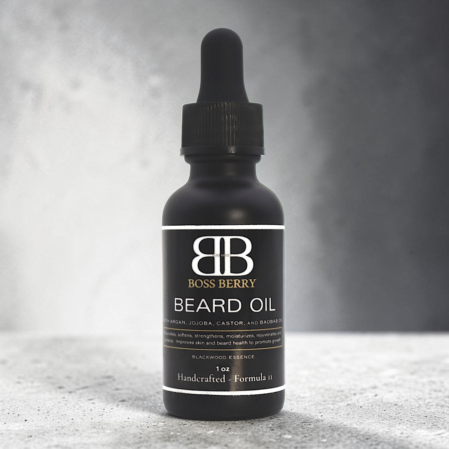 Boss Berry beard oil bottle on a textured surface with a gray background